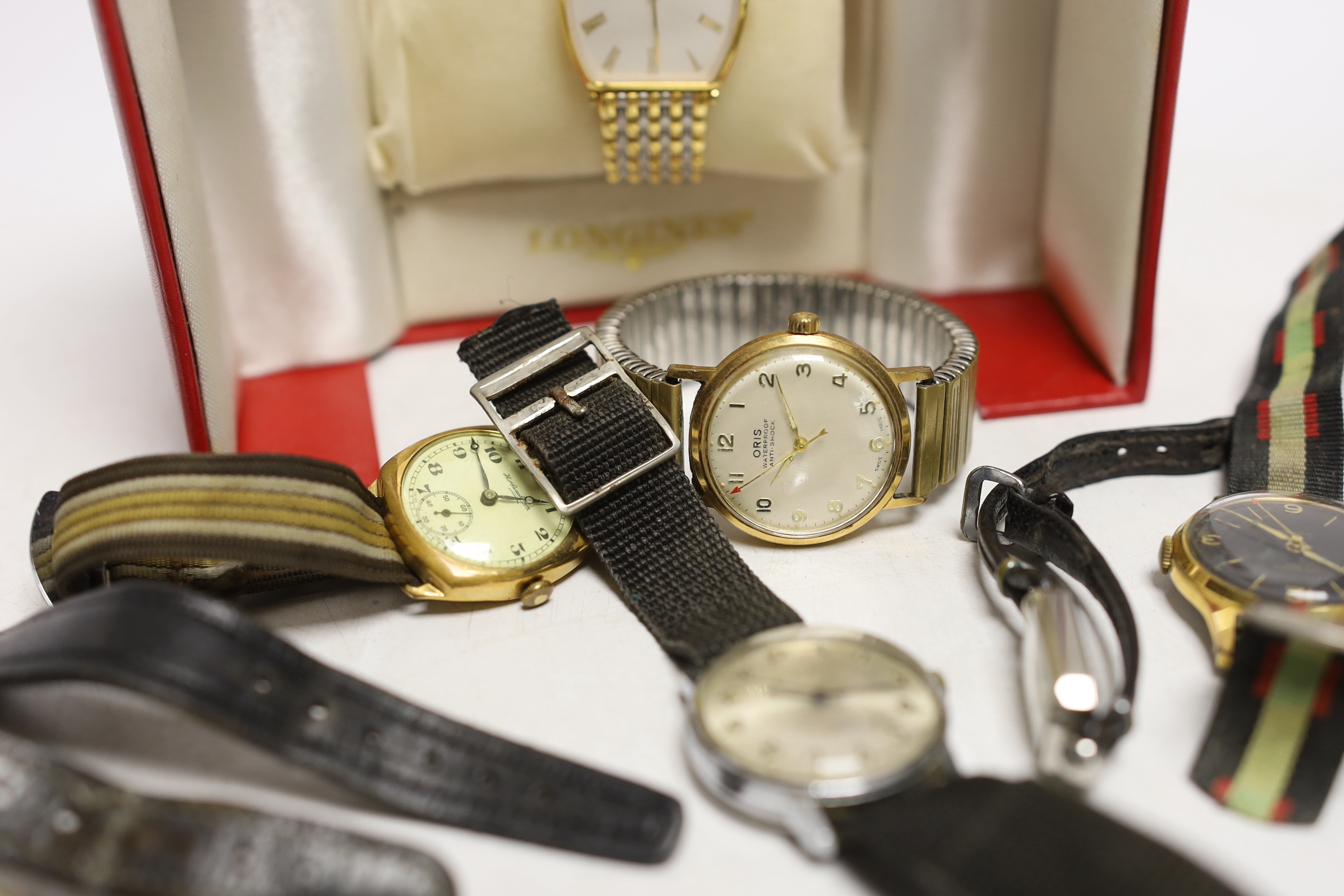 A gentleman's steel and gold plated Longines quartz wrist watch, with box, a lady's steel Jaeger LeCoultre manual wind wrist watch and eight other assorted gentleman's wrist watches including Ingersoll, Accurist and Oris